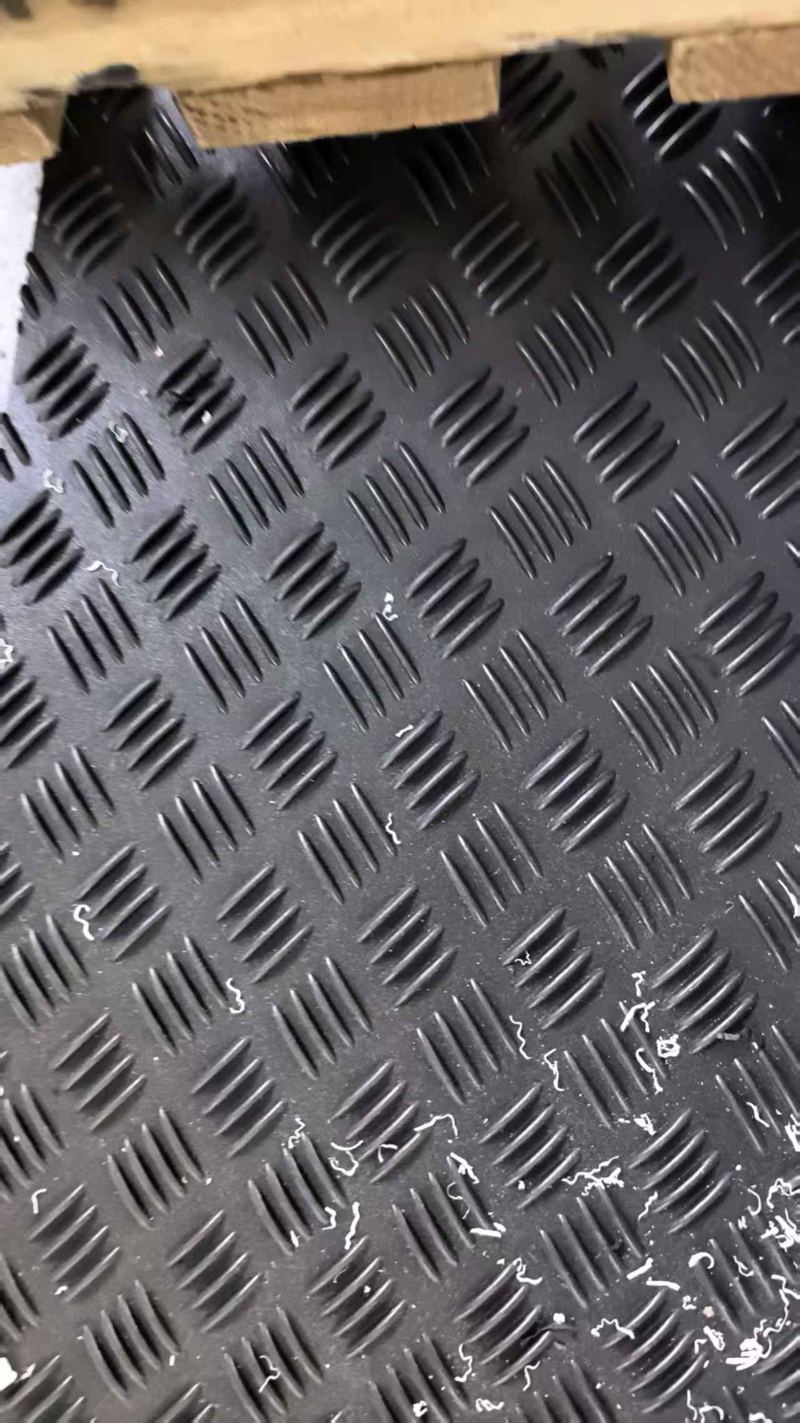 Black mat tread pattern close-up